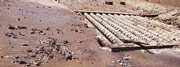mud and sediment in storm structures require ongoing maintenance