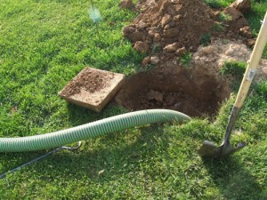 sewer hose coming out of a septic tank
